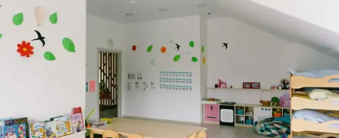 Bright child friendly shelter spaces with wooden bunk beds and playful classroom decor